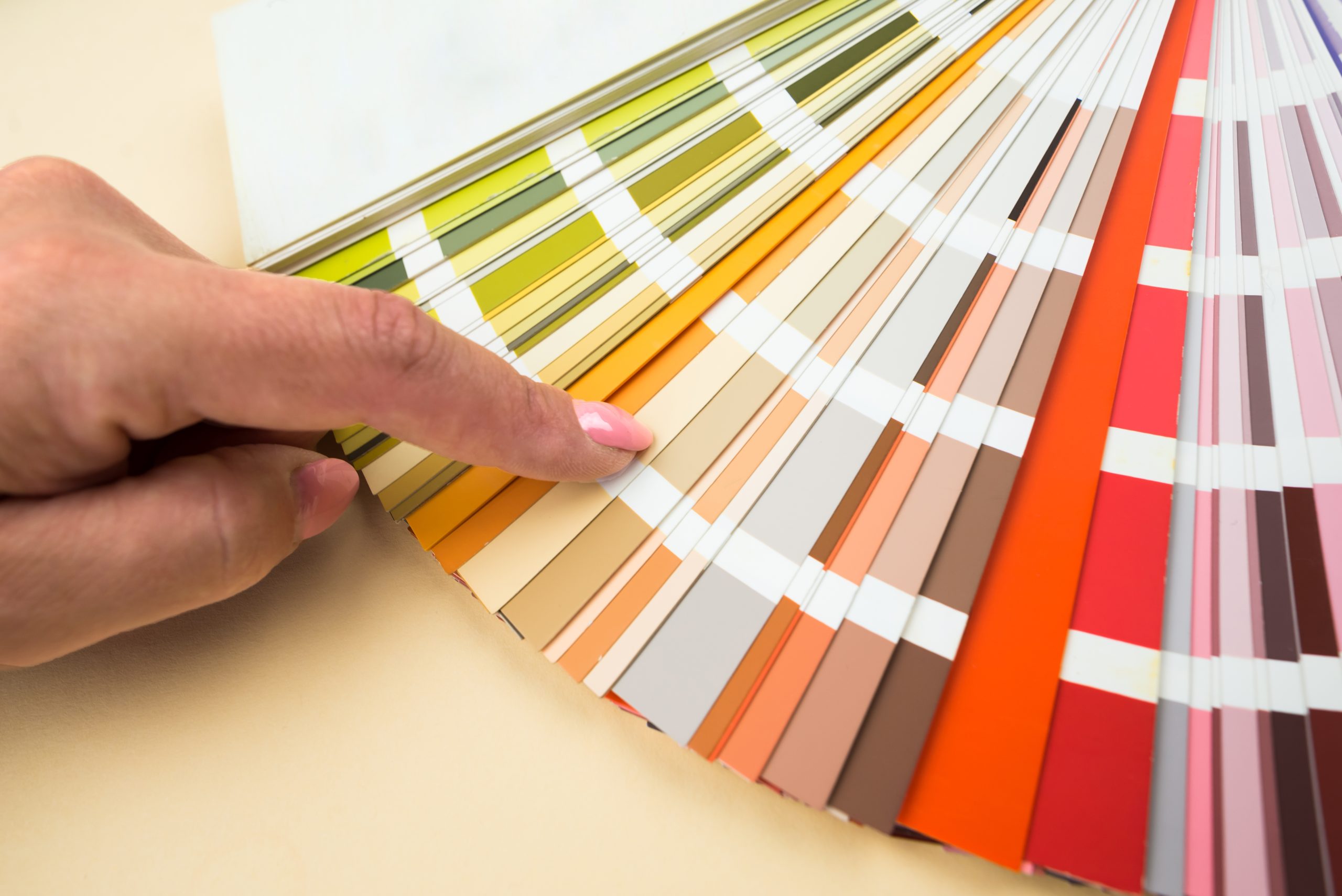 Person,With,A,Finger,Shows,To,The,Selected,Color,In